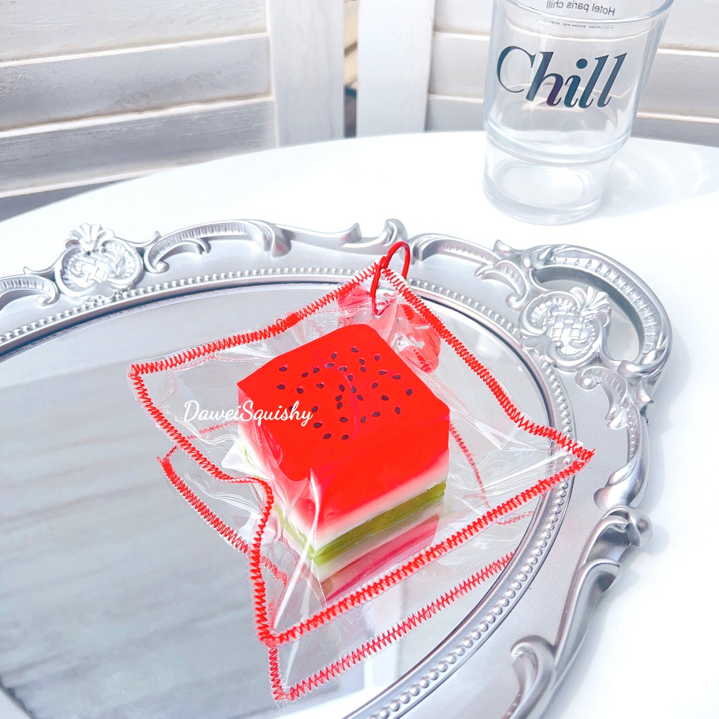 CLEAR WATERMELON CUBE SQUISHY TOY
