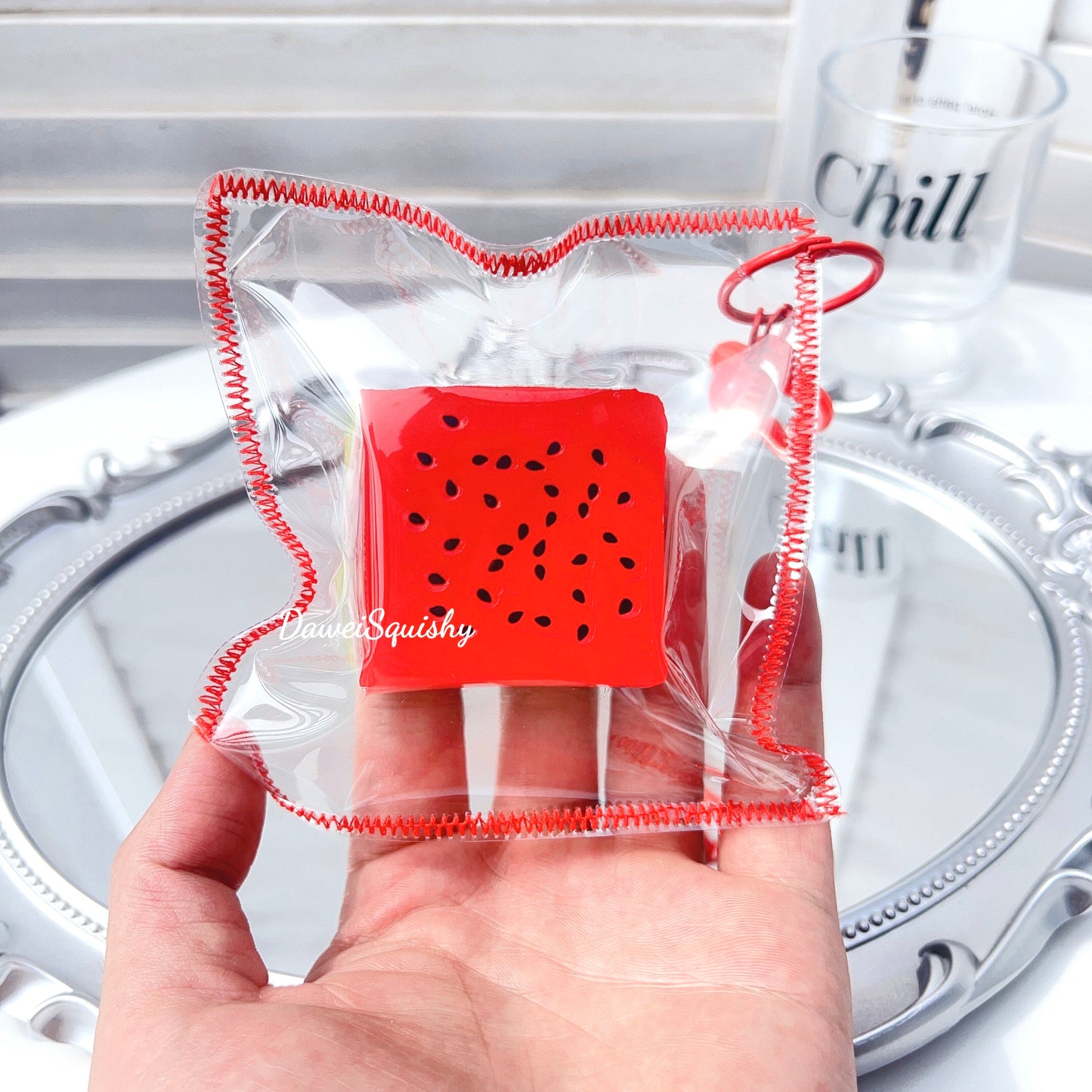 CLEAR WATERMELON CUBE SQUISHY TOY