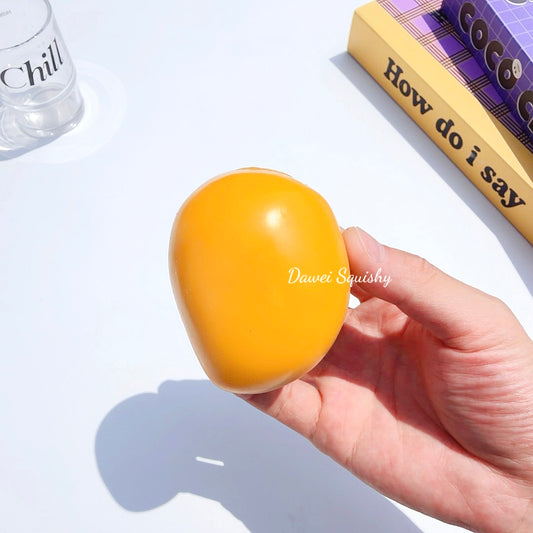 2 VERSIONS COLOR CHANGE MANGO SQUEEZE TOY