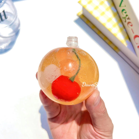 CHERRY ORANGE BUBBLE WATER STRESS BALL