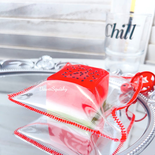 CLEAR WATERMELON CUBE SQUISHY TOY